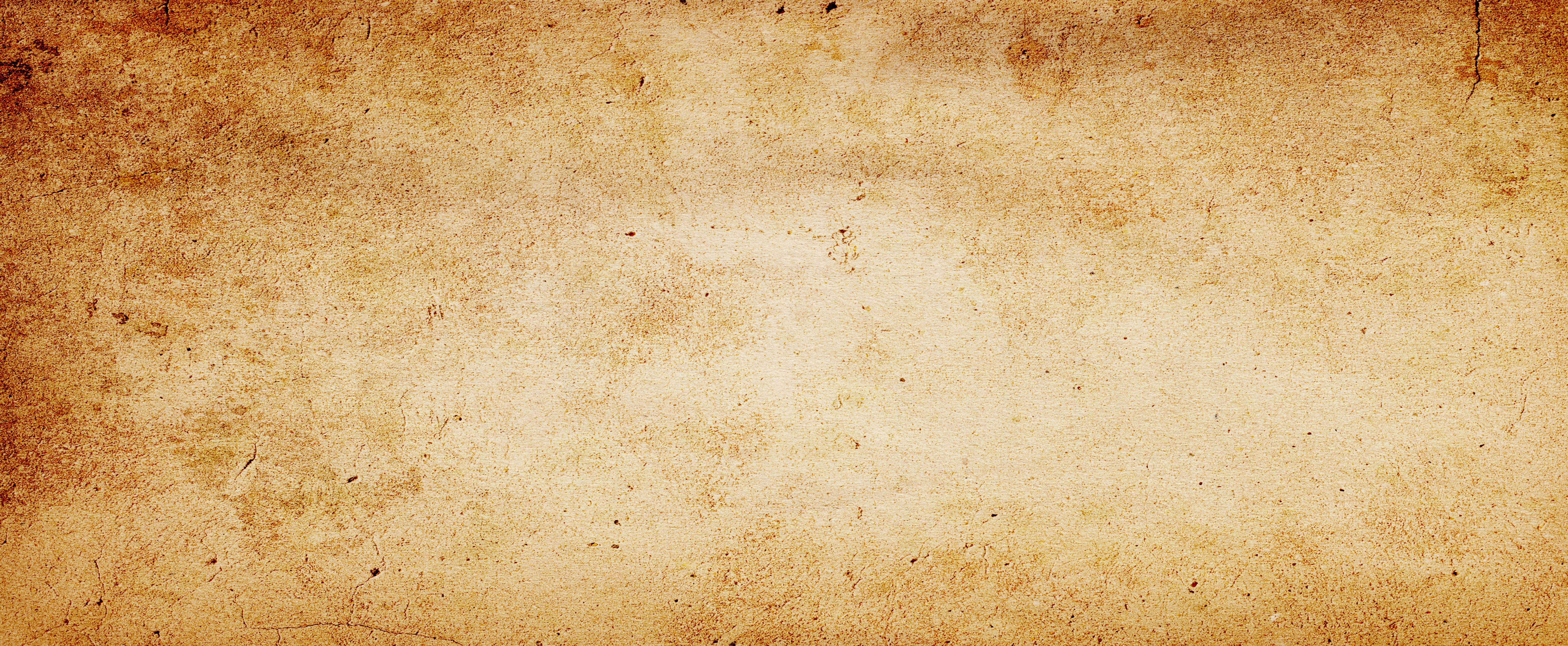 Old brown paper parchment background design with distressed vintage stains and ink spatter and white faded shabby center, elegant antique beige color